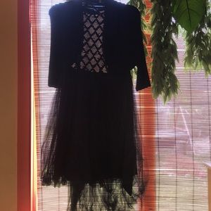 A semi formal dress size 14 with a cardigan blous